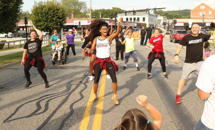 Dancing in the street: Members of Mixxedfit entertained with their high energy dance routines.