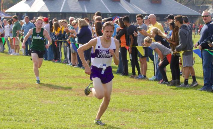 Photos by William Dimmit Crusader Daniel Hynes took sixth with a time of 16:08.94.