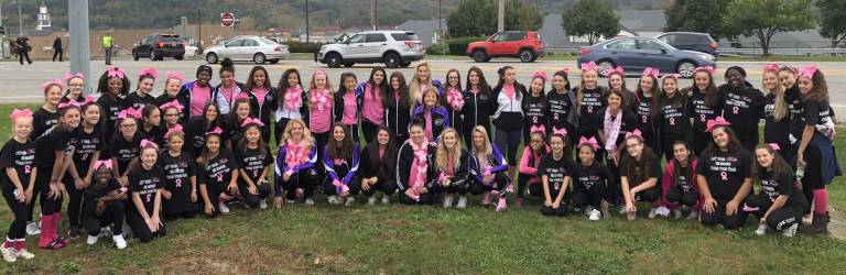 Many people came to the Breast Cancer Walk at the Woodbury Commons to walk under the team name, with more than 100 of them being Monroe-Woodbury cheerleaders from the varsity, JV and modified teams.