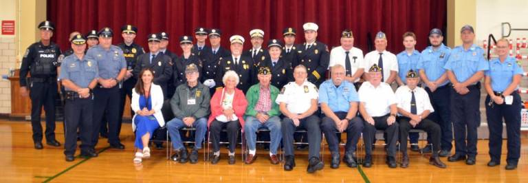 Pictured are members of Greenwood Lake and Warwick Police Departments, the Greenwood Lake Fire Department, American Legion, Ambulance Corps, local EMS along with other guests.