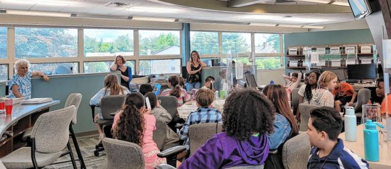 North Main Newspaper Club visits The Photo News headquarters