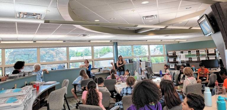 North Main Newspaper Club visits The Photo News headquarters