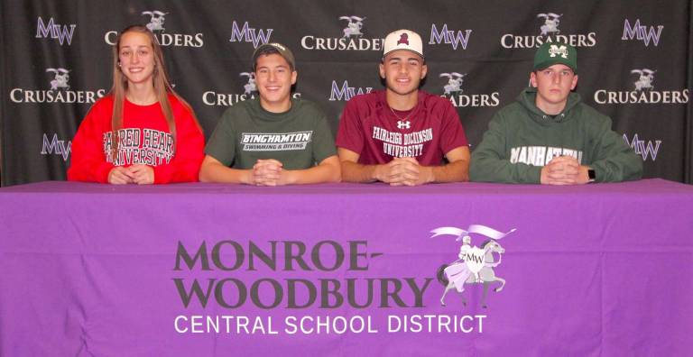 Photo by William DimmitOn their way: Monroe-Woodbury scholar athletics pose for a photo after signing their National Letters of Intent. From let to right are: Lisa Jacobsen, Chris Egan, Nick Rivera and Danny Fitzpatrick.