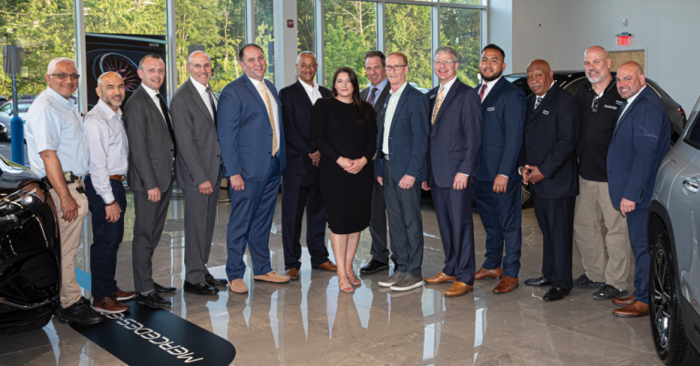 General Manager and Regional Manager Mark Webster with his staff at Mercedes-Benz of Orange County staff celebrates five years at 1 Mercedes Way in Harriman. Photos provided by MBOC.