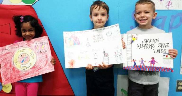 Fire Safety Poster contest winners from Sapphire Elementary: Kindergarten students Vivian Sebastian, Michael McMahon and Anthony Braunagel.