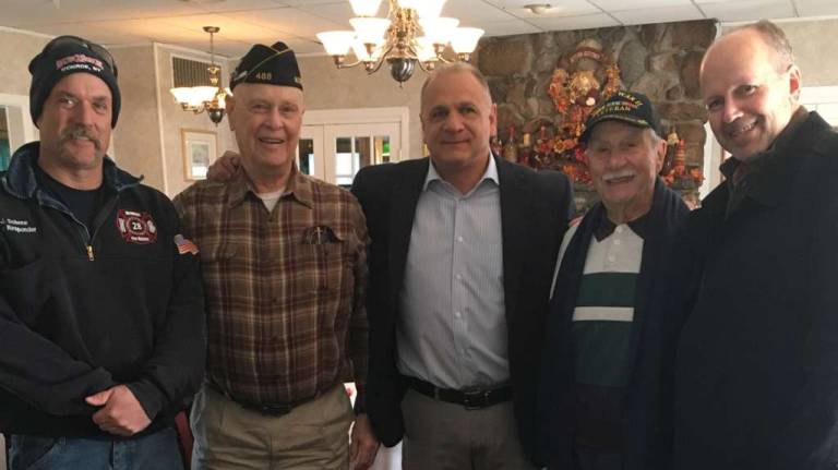Provided photo On Saturday morning, Nov. 11, Tom and Sherry Jones once again hosted and donated breakfast for dozens of veterans at the Birchwood Restaurant and Catering at Monroe Country Club. Pictured from left to right are Town of Monroe Highway Superintendent John Scherne, Korean War veteran Jim Knox, Monroe Town Councilman Tony Cardone, World War II veteran Vincent &quot;Sonny&quot; Marino and Monroe Village Trustee Neil Dwyer.