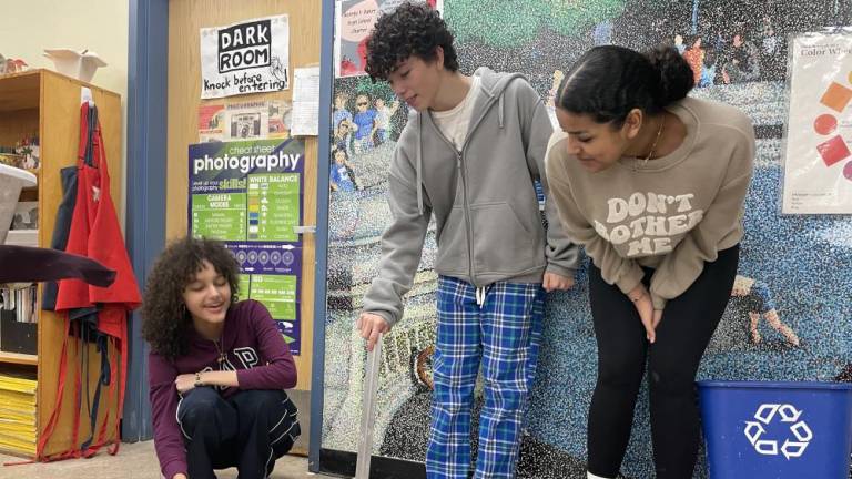 George F. Baker High School students test out mini catapults.