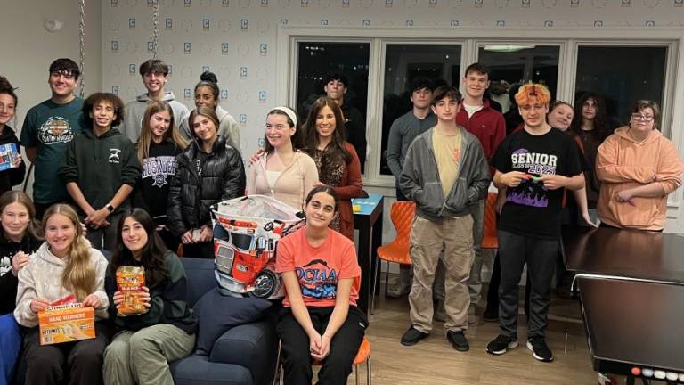 Teens from across Orange County NY gather at Chabad’s CTeen program to collect items and cook food for the Jennings Creek Wildfire first responders.